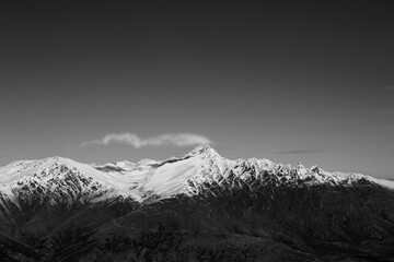 Winter landscape of snow mountain against blue sky in South island, New Zealand.