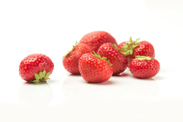 Handful of strawberries on white background, isolate
