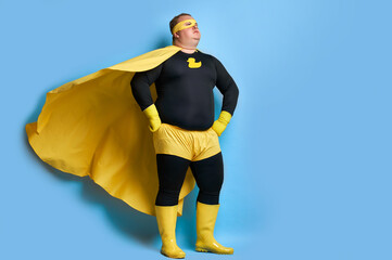 handsome brave strong man has a mad desire, a dream to shield the world from dirt and evil. fat...