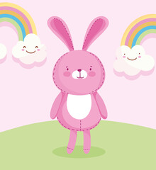 Obraz na płótnie Canvas pink rabbit rainbows grass toys object for small kids to play cartoon