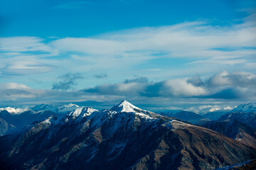 Winter landscape of snow mountain against blue sky in South island, New Zealand.