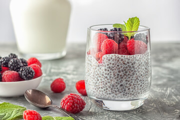 Vegan healthy food. Chia pudding with coconut milk, fresh raspberries and blackberries