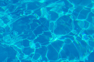 water in swimming pool rippled water detail background