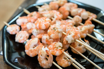 Delicious grilled shrimp on skewer ready to eat.