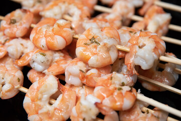 Delicious grilled shrimp on skewer ready to eat.