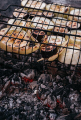 Grilled vegetables, vegetable kebab. Delicious and healthy food for vegans. Zucchini, eggplant and sweet bell pepper on the fire.
