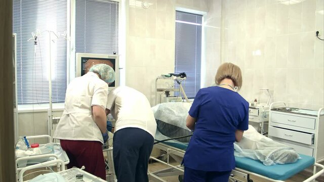 Teamwork during gastroendoscopy to patient in hospital