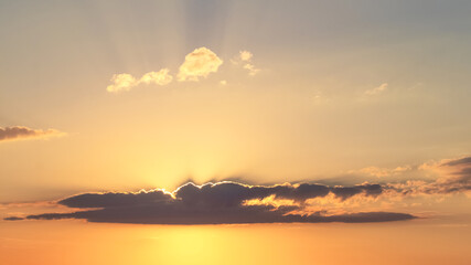 Dark cloud in the evening sky at sunset