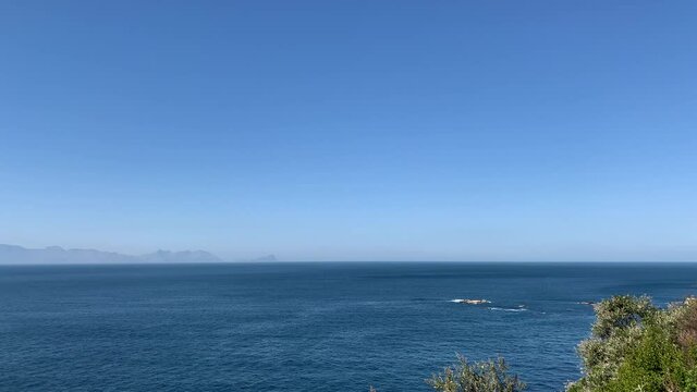 Entrance of False Bay with the view of Hangklip in Pringle Bay in Kogelberg Biosphere Reserve in the far background on the Cape Peninsula