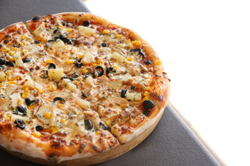 Delicious fresh pizza on table outdoors, closeup