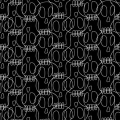 Seamless vector pattern of skulls with teeth white lines on black background