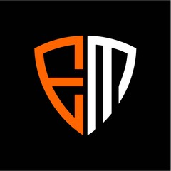 E M initials white orange shield with black background