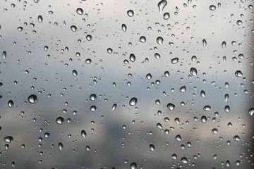 Rain drops on a glass window. Selective focus