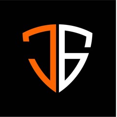 J G initials white orange shield with black background