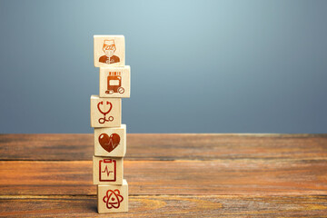 Block tower with medical icons symbols. Healthcare and medical Insurance concept. Supplies,...