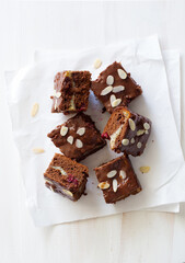 Bars of homemade chocolate, cheese and cherries cake