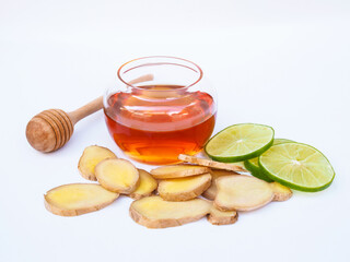 Ingredients for juice drinks or tea with honey, lime lemon and ginger