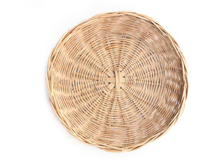 Above of woven bamboo basket isolated on white background.