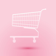 Paper cut Shopping cart icon isolated on pink background. Online buying concept. Delivery service sign. Supermarket basket symbol. Paper art style. Vector. © mingirov