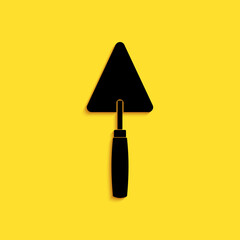 Black Trowel icon isolated on yellow background. Long shadow style. Vector.