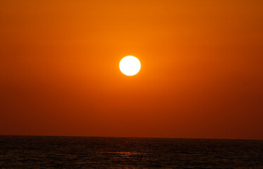 Sunset on the horizon of the Mediterranean sea