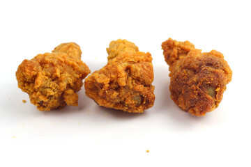 Crispy fried chicken on a white background