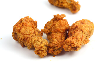 Crispy fried chicken on a white background