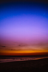 Fototapeta na wymiar Concept: Serendipity. Neowise Comet. Sunset over the beach.