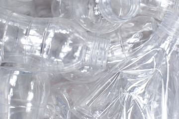 Used sorted for recycling plastic bottles, the concept of recycling waste, ecology, land pollution on a wooden background. Top view. banner