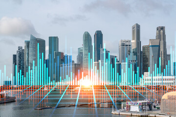 Forex and stock market chart hologram over panorama city view of Singapore, the financial center in Asia. The concept of international trading. Double exposure.