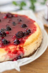Classic New York cheesecake  on wooden background, close up view, selective focus