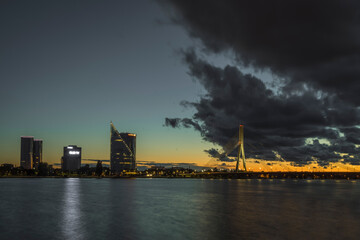 Fototapeta na wymiar Cable stayed bridge across Daugava river at night in Riga, Latvia.