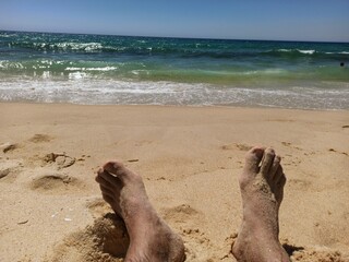 Fototapeta premium feet on the beach