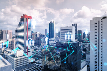 Obraz premium Social media icons hologram over panorama city view of Bangkok, Asia. The concept of people networking and connections. Double exposure.