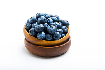 blueberries in  wooden cup