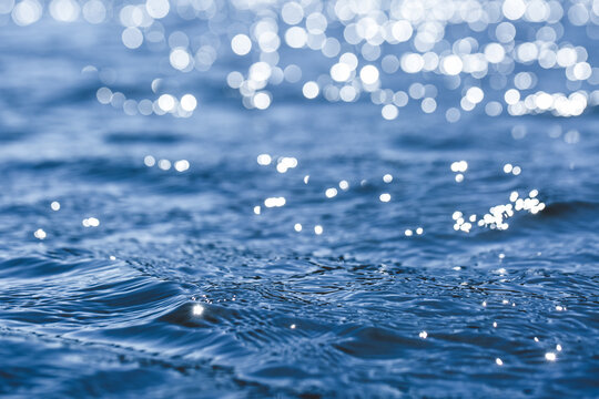 Abstract dark deep blue water sea for background. close up, low angle view. ocean waves