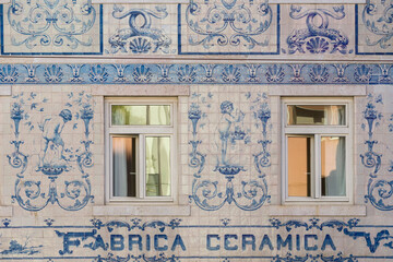 facade of a ceramic factory in blue and white azulejos in Lisbon Portugal