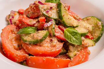 Georgian vegetable salad with peanut sauce cucumber, tomato, pepper
