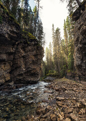 Johnston Canyon with stream flowing in rock cliff at Banff national park