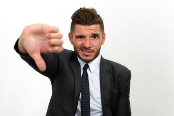 Portrait of handsome bearded Hispanic businessman in suit
