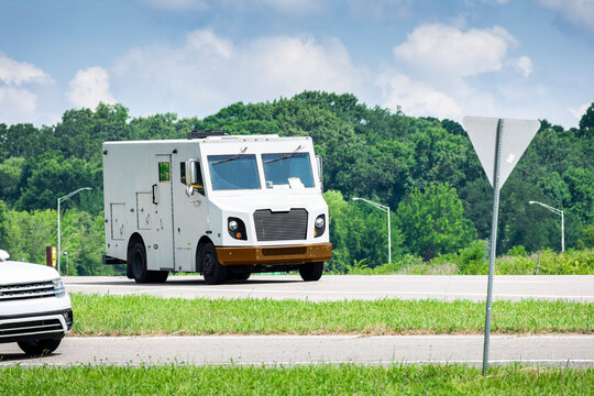 Unmarked Armored Car In Traffic