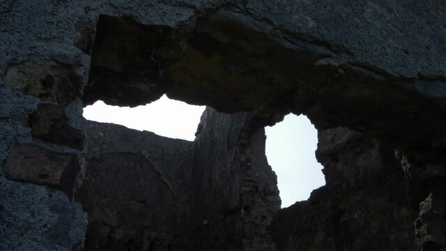 Cinematic tracking shot of ancient ruins on Inis Mor Aran Island, Ireland