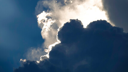 Dark Storm Clouds With Brilliant Sunshine Coming