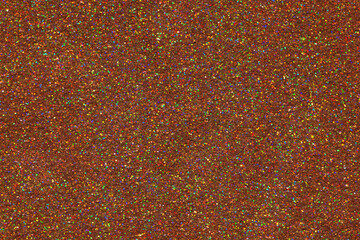 Luxury gold glitter texture with bright sparkles and flickers on the white isolated background. Shiny glamour background