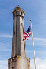 flag of the united states and tower