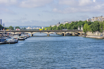 View of Jena Bridge (Pont d'Iena, 1814). Jena Bridge spanning River Seine in Paris, it links Eiffel Tower on the Left Bank to the district of Trocadero on the Right Bank. Paris, France.