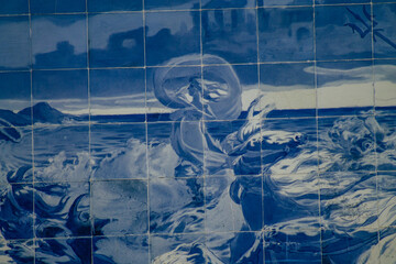 Closeup of the blue mosaic of the facade of the Carlos Lopes pavilion located in the Eduardo VII park of Lisbon, the hilly coastal capital city of Portugal
