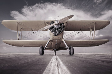 historical biplane on a runway ready for take off - obrazy, fototapety, plakaty