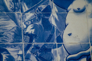 Closeup of the blue mosaic of the facade of the Carlos Lopes pavilion located in the Eduardo VII park of Lisbon, the hilly coastal capital city of Portugal
