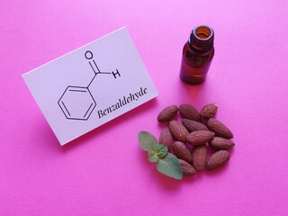 Structural chemical formula of benzaldehyde molecule with almond oil. It is an aromatic aldehyde...